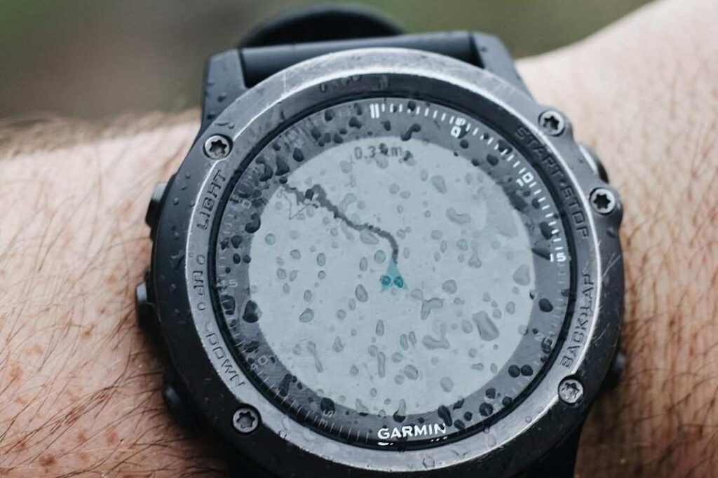 Garmin watch displaying dog tracking data from a Garmin Alpha dog tracker system.